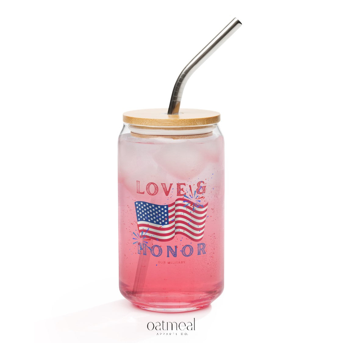 Pink glass jar with American flag design, bamboo lid, and metal straw on a white background at Oatmeal Apparel Co.