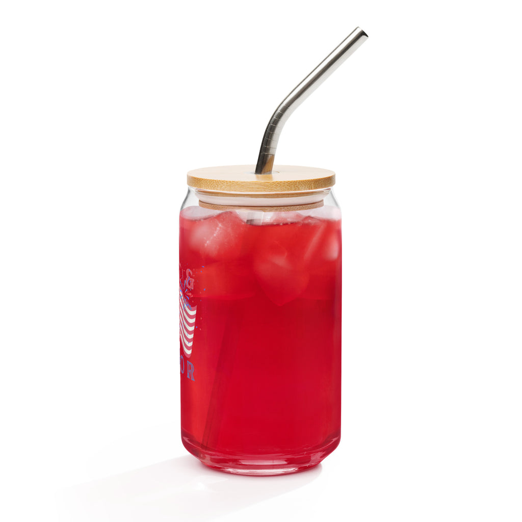 Red drink in a glass with a bamboo lid and metal straw on a white background at Oatmeal Apparel Co.