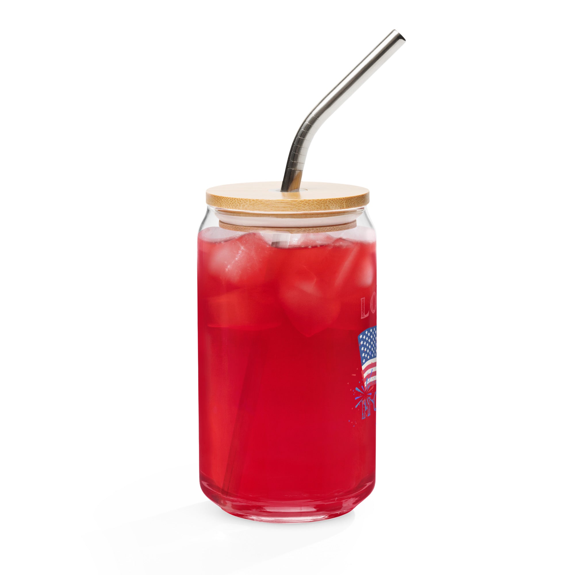 Red drink in a glass with a bamboo lid and metal straw on a white background at Oatmeal Apparel Co.