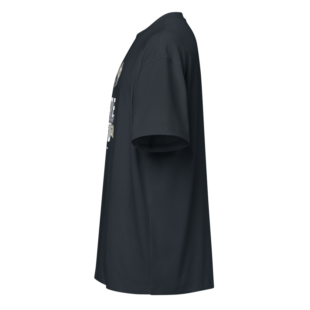 Black t-shirt with a small white logo on the sleeve against a white background at Oatmeal Apparel Co.