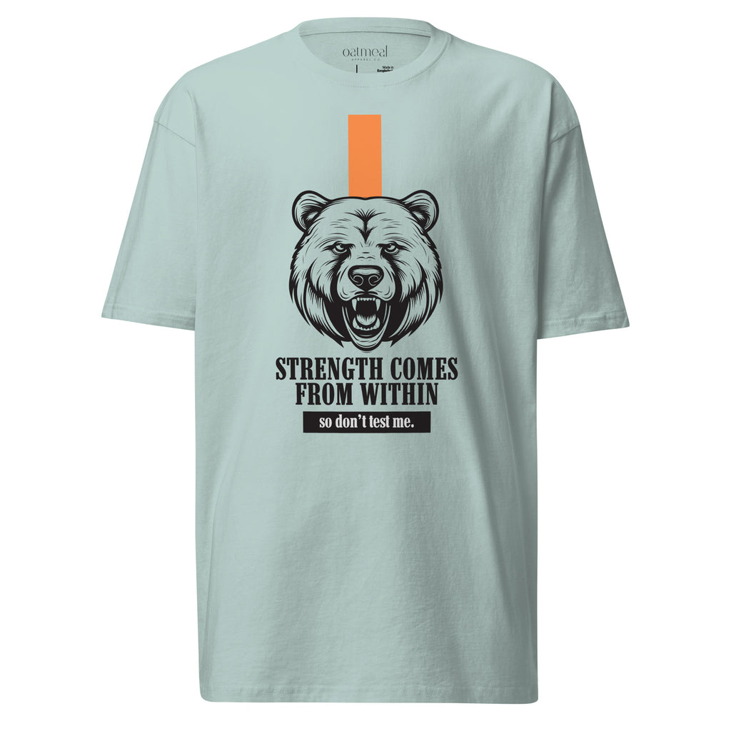 Light blue t-shirt with bear graphic and motivational text on a white background at Oatmeal Apparel Co.