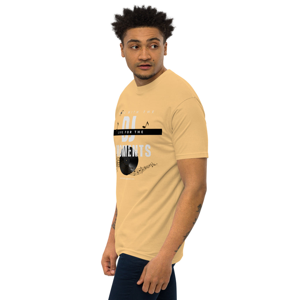 Man wearing a beige DJ-themed t-shirt with text and graphics on a white background at Oatmeal Apparel Co.
