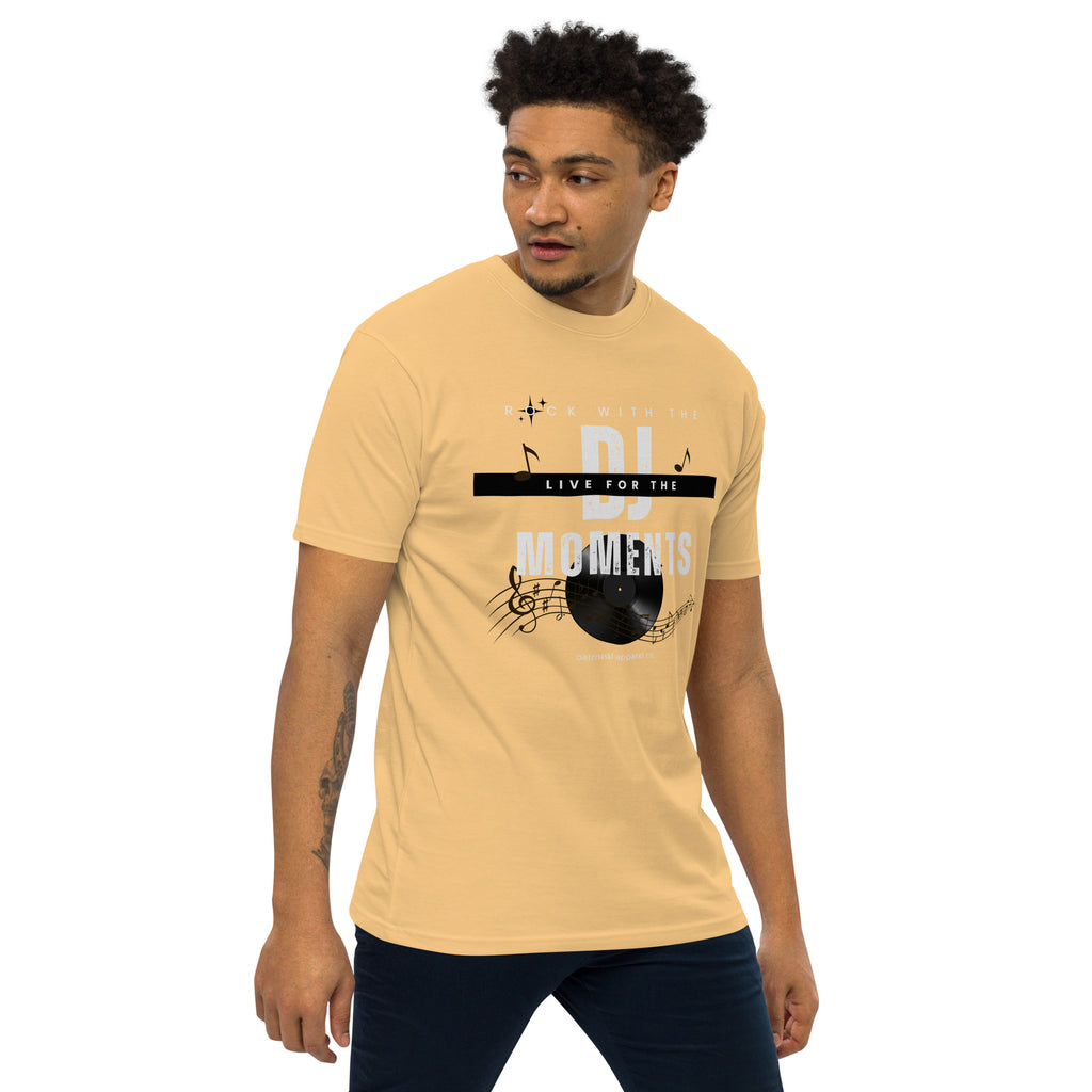 Man wearing a beige DJ-themed t-shirt with text and graphics on a white background available at Oatmeal Apparel Co.