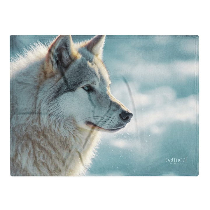 Wolf in profile blanket with a snowy background at Oatmeal Apparel Co.
