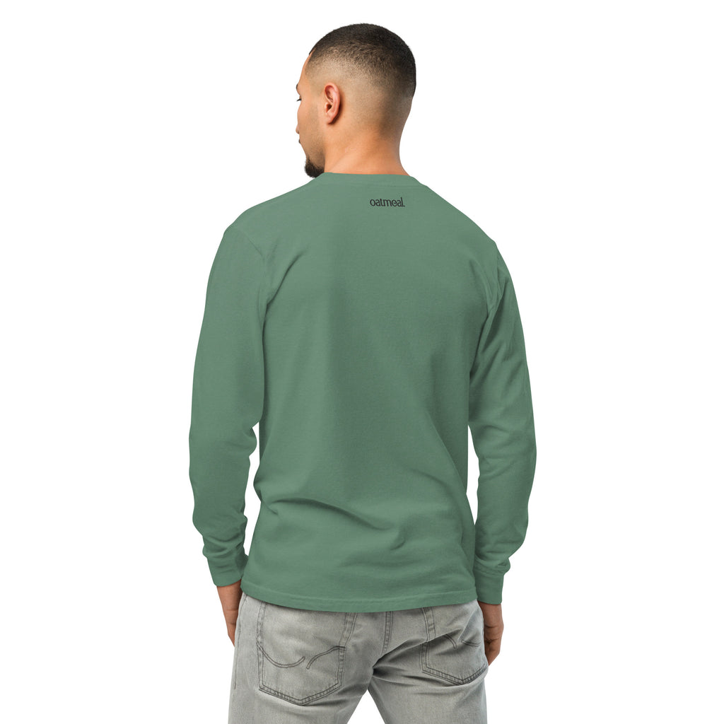 Showing the back of a person wearing a green Long-sleeve t-shirt with 'oatmeal' branding on a white background at Oatmeal Apparel Co.