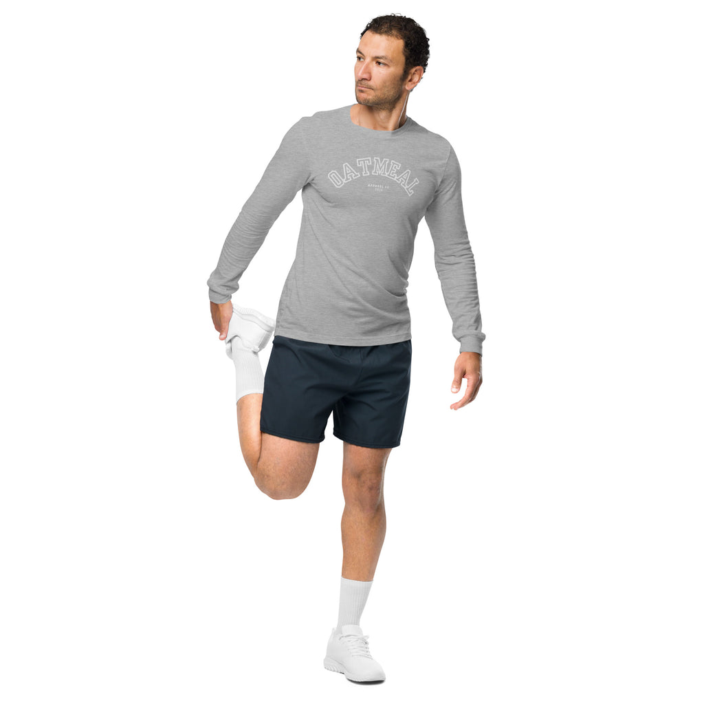 Man working out wearing a gray long-sleeve shirt and navy shorts on a white background at Oatmeal Apparel Co., Sports Edition Design.