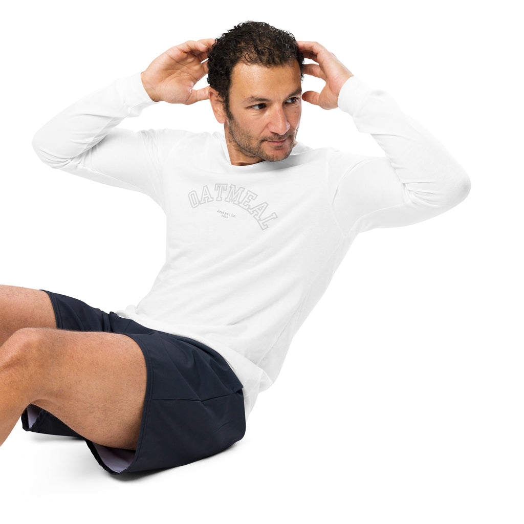 Man working out wearing a white long-sleeve shirt with 'oatmeal' branding at Oatmeal Apparel Co., Sports Edition Design.