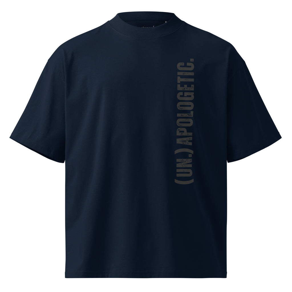 Navy blue t-shirt with a vertical 'unapologetic' logo on a white background at Oatmeal Apparel Co.
