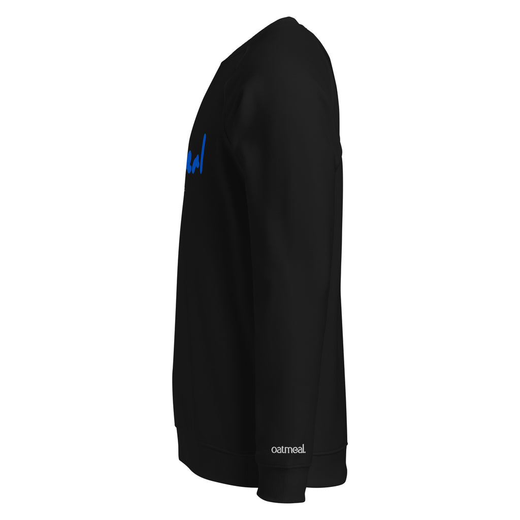 Side of Black sweatshirt with a blue 'oatmeal' logo on front and 'oatmeal' branding embroidered on the sleeve against a white background at Oatmeal Apparel Co.