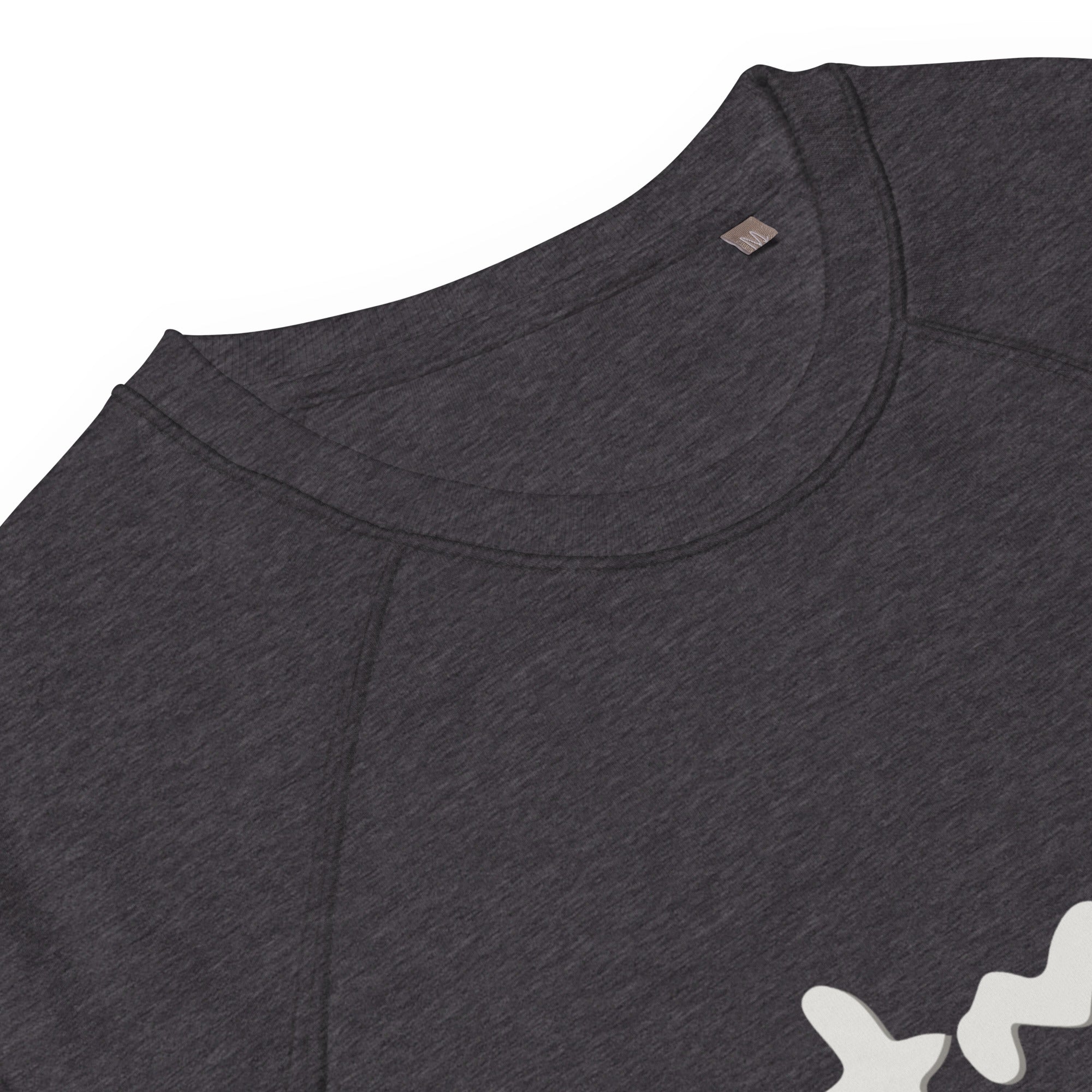 Close-up of a dark gray t-shirt with a brand logo on a white background at Oatmeal Apparel Co.