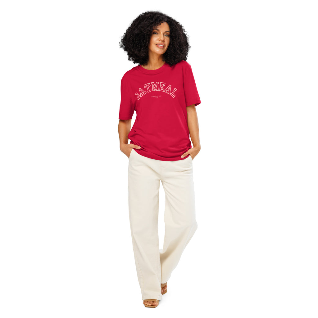 Woman wearing a red t-shirt with 'oatmeal' branding and white pants at Oatmeal Apparel Co., Sports Edition Design.
