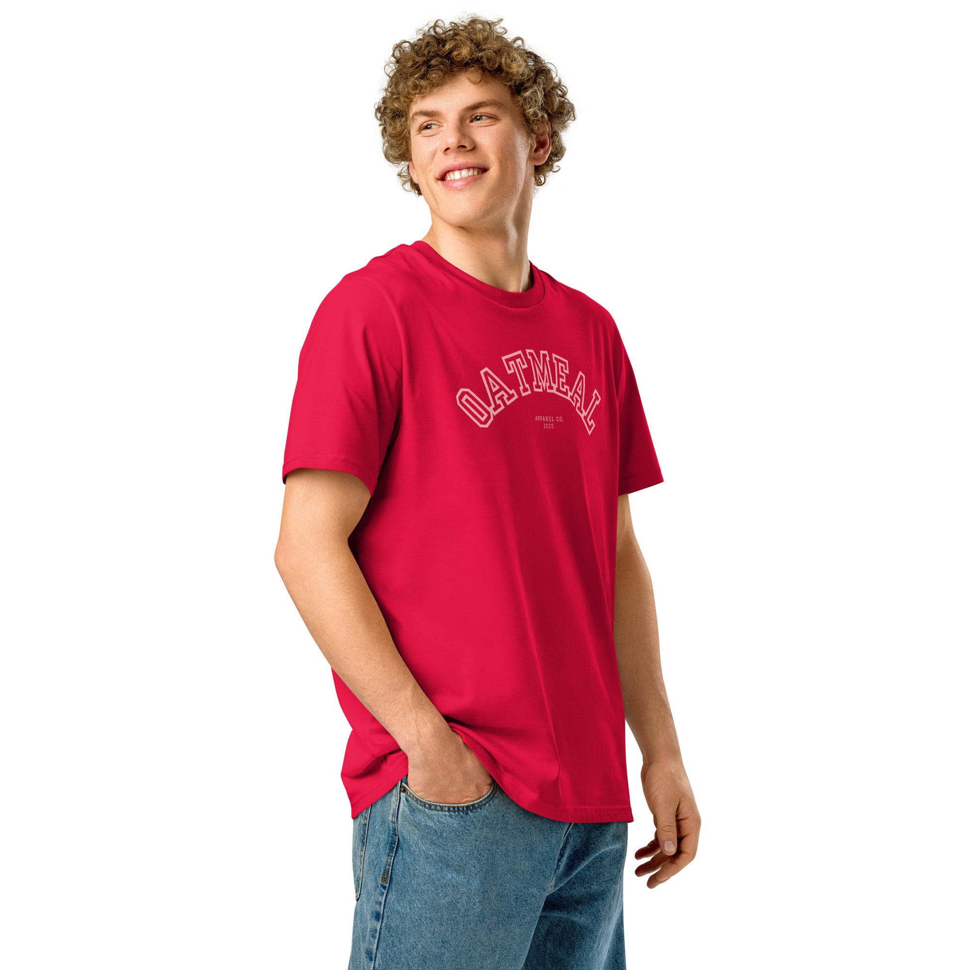Person wearing a red t-shirt with 'Oatmeal' sports logo on a white background at Oatmeal Apparel Co., Sports Edition Design.