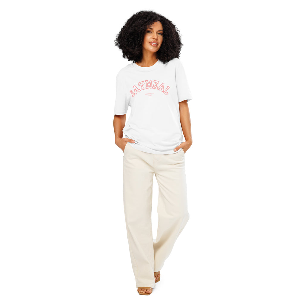 Woman wearing a white t-shirt with 'oatmeal' branding and beige pants at Oatmeal Apparel Co., Sports Edition Design.
