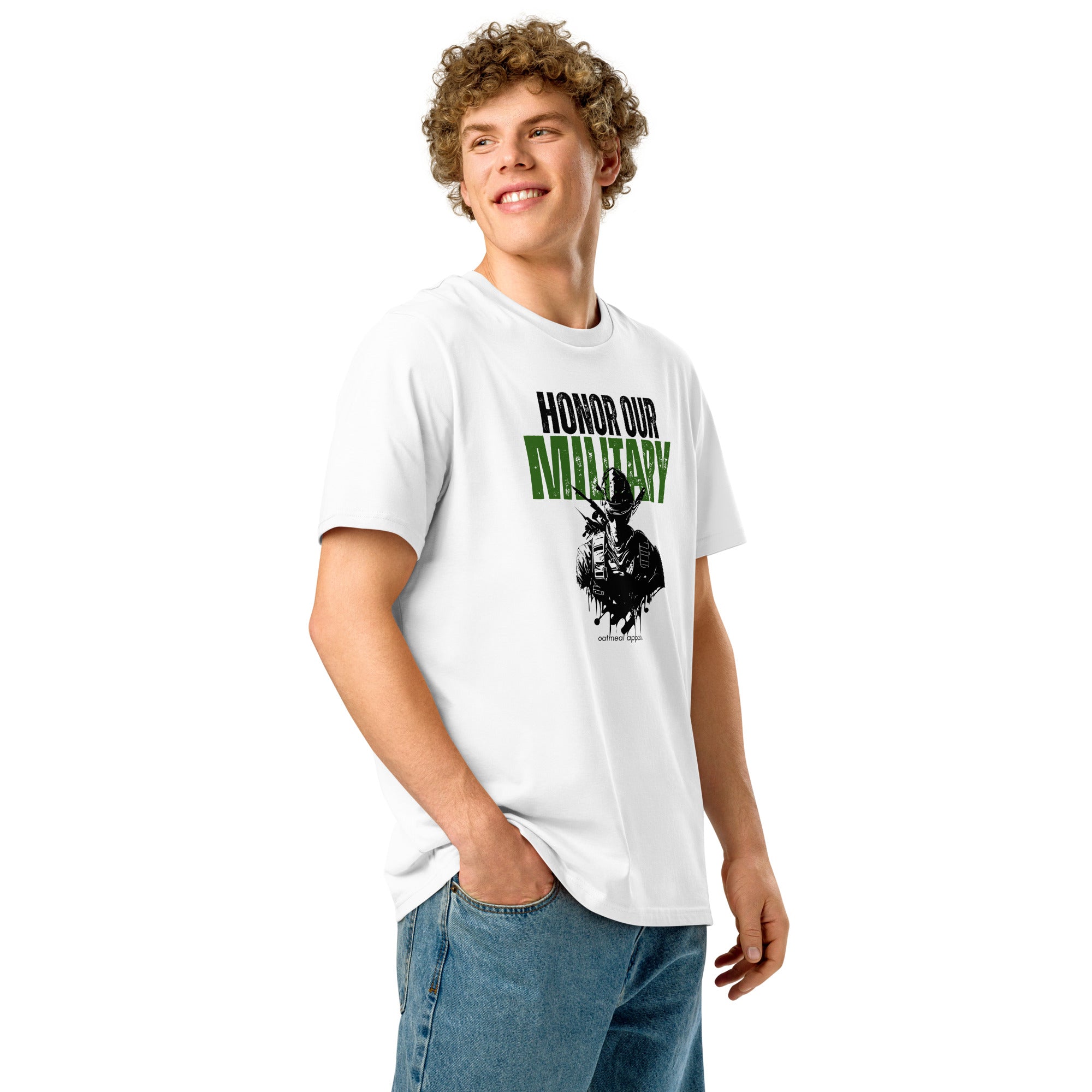 Person wearing a white t-shirt with 'Honor Our Military' graphic on a white background at Oatmeal Apparel Co.