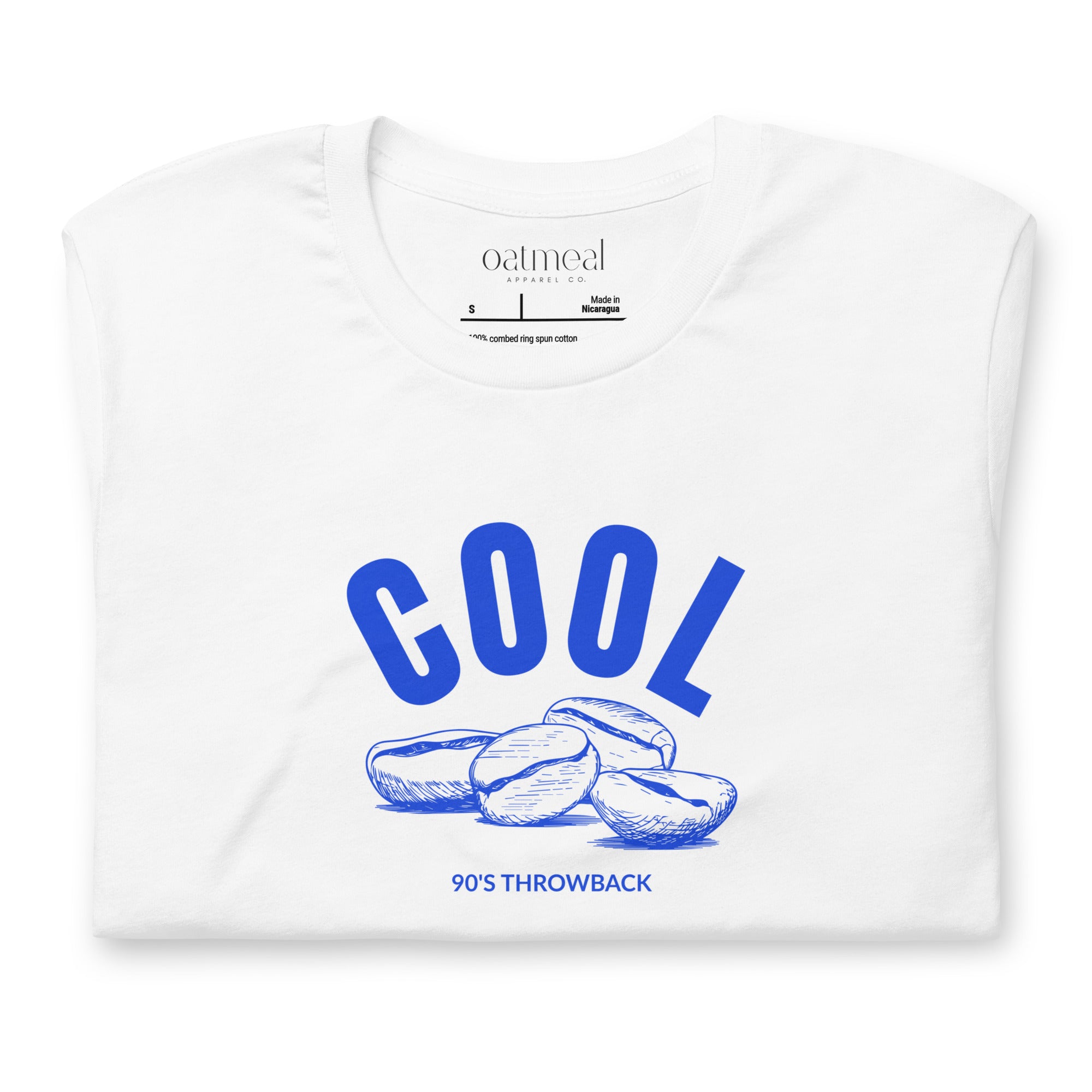 White t-shirt with 'Cool Beans' blue graphic and text on a white background at Oatmeal Apparel Co.