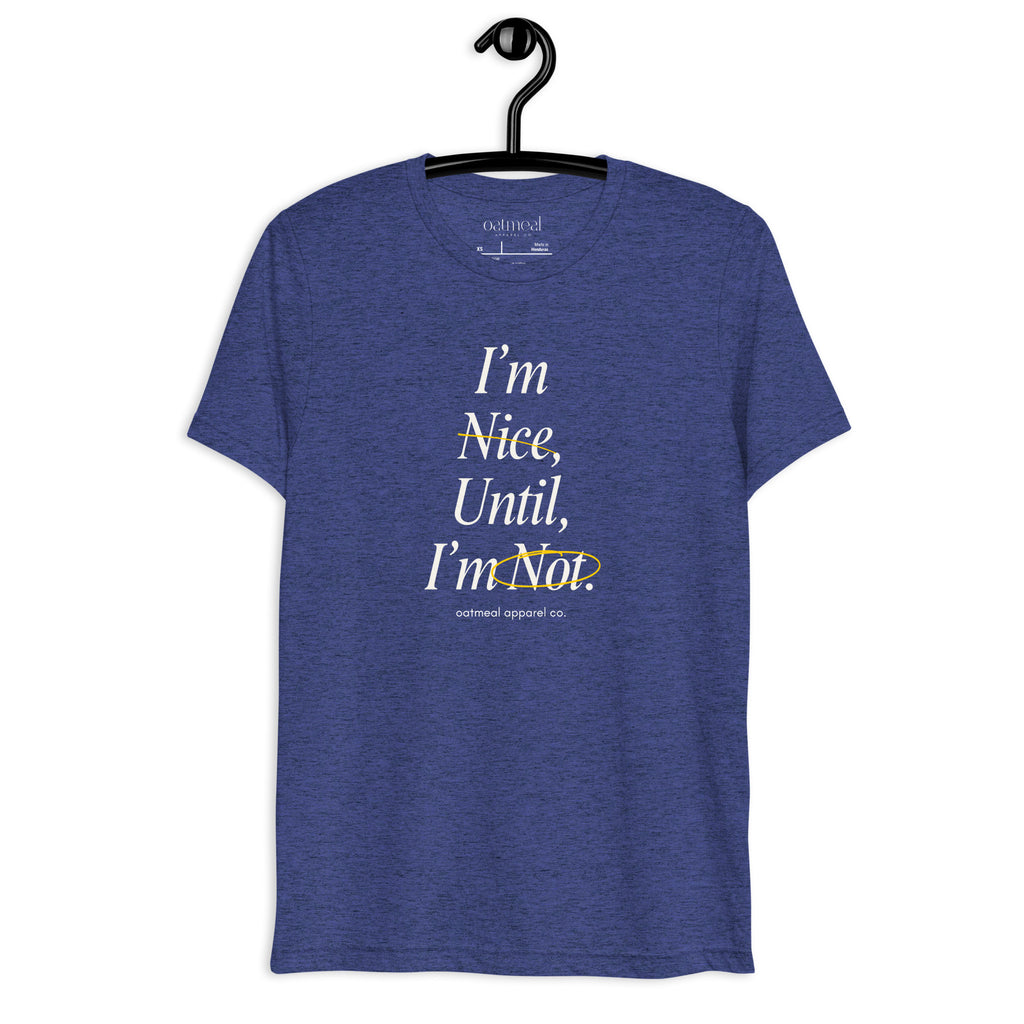 Blue t-shirt with text 'I'm Nice, Until, I'm Not' on a hanger against a white background at Oatmeal Apparel Co.