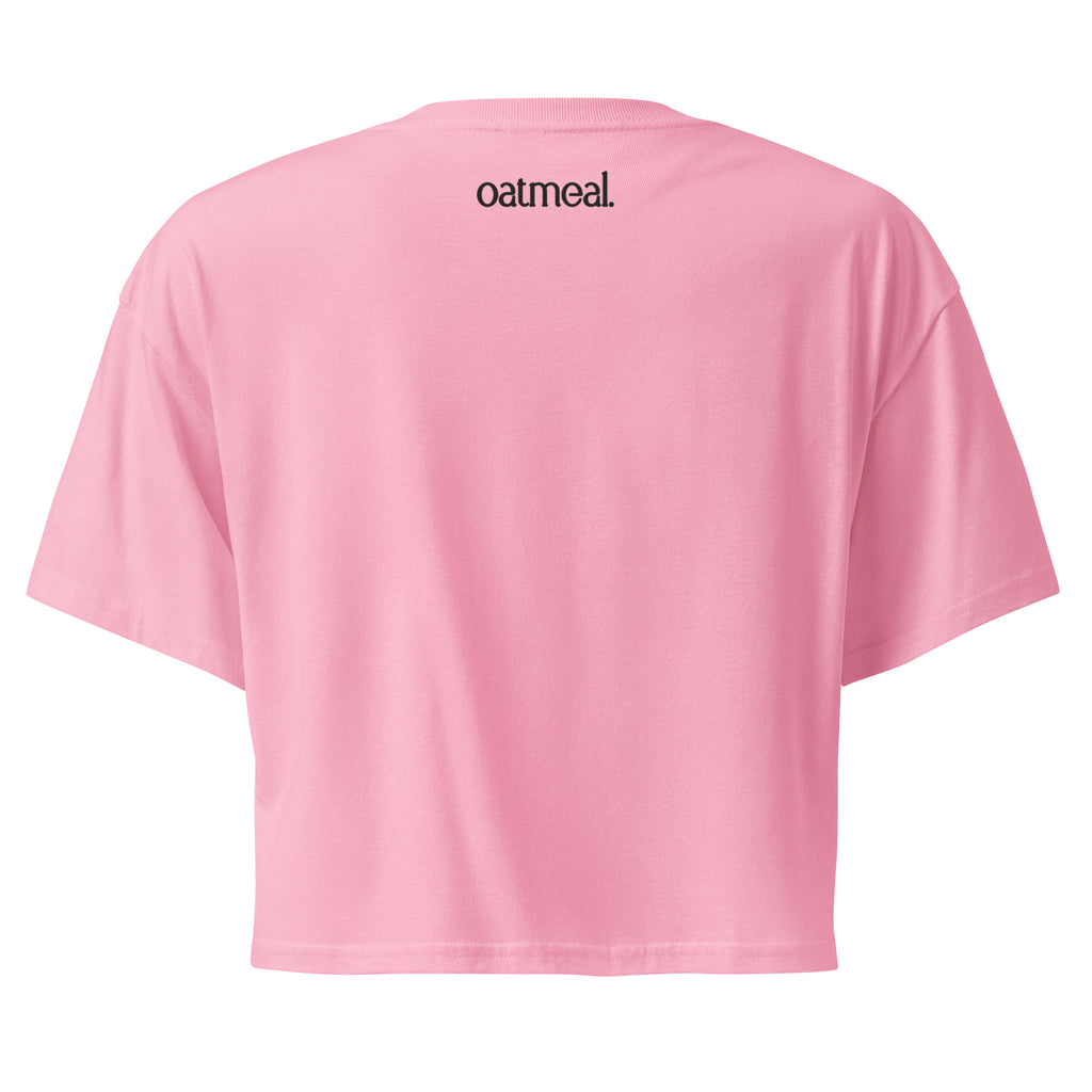 Pink t-shirt with 'oatmeal' logo on the back against a white background at Oatmeal Apparel Co.