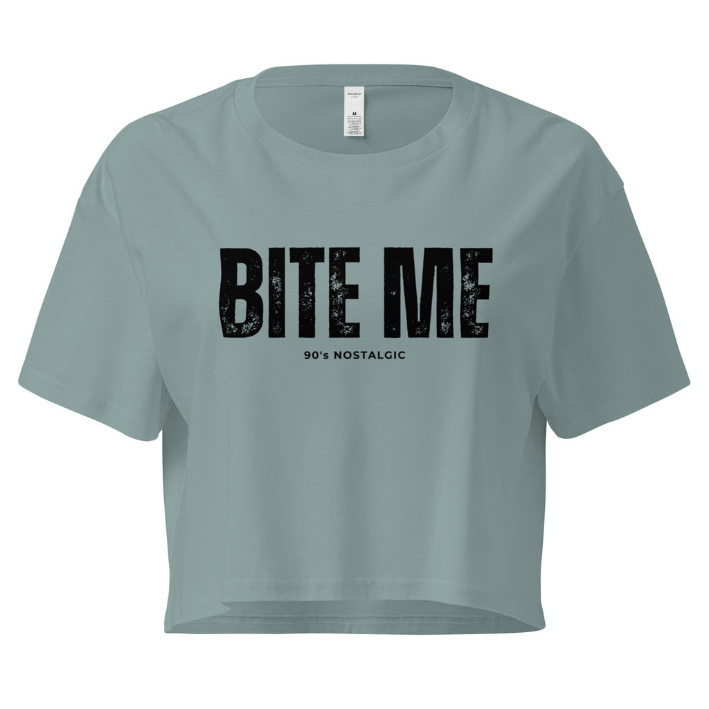 Mineral color crop top with 'BITE ME 90's NOSTALGIC' text on a white background at Oatmeal Apparel Co.