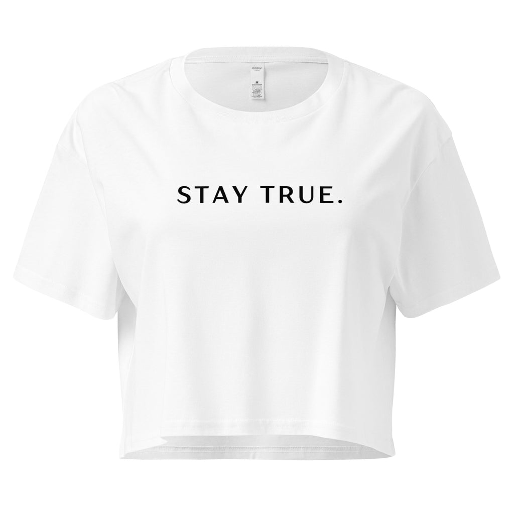 White crop top with 'STAY TRUE.' text on a white background at Oatmeal Apparel Co.