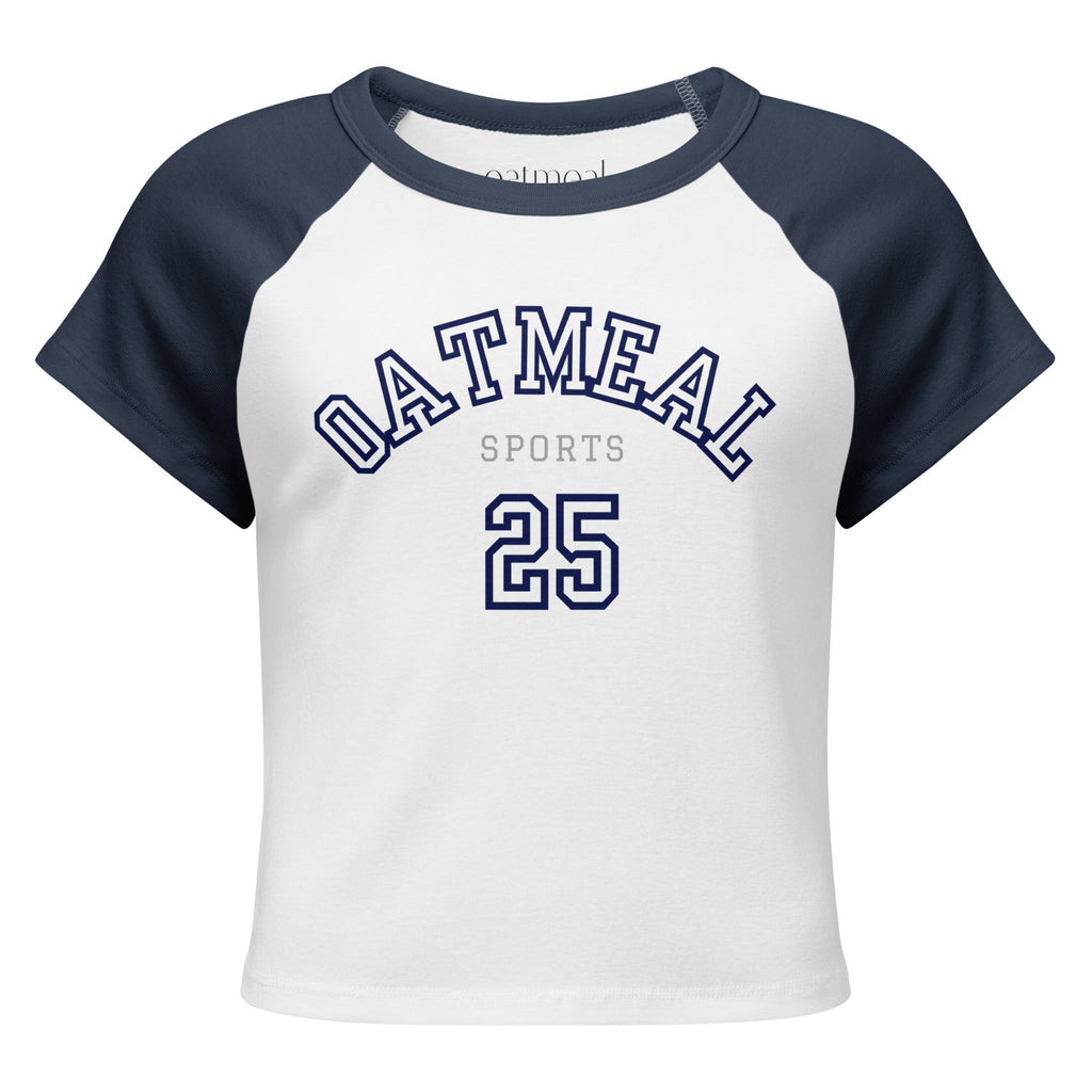 White and navy baseball-style shirt with 'Oatmeal Sports' text and number 25 on a white background at Oatmeal Apparel Co.
