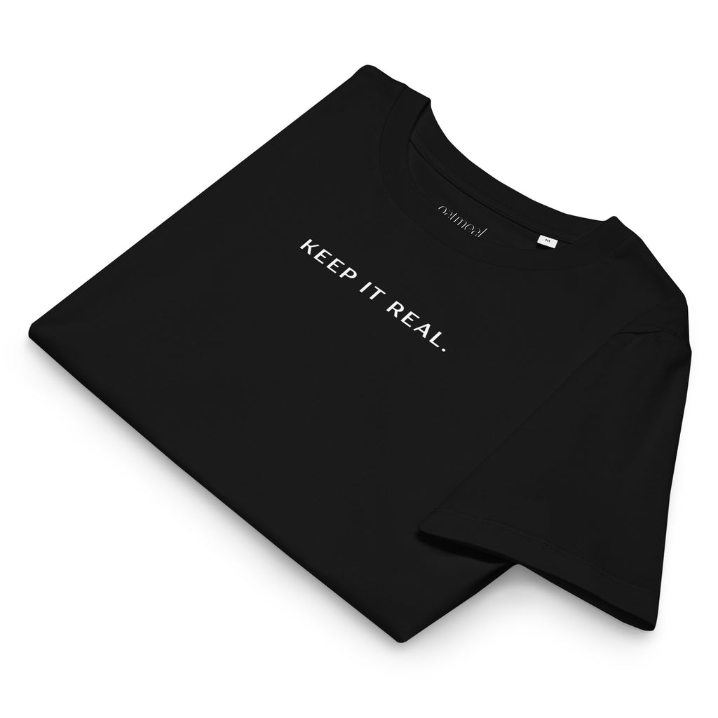 Luxurious Women's Organic Cotton Black t-shirt with 'KEEP IT REAL.' text on a white background, available at Oatmeal Apparel Co.