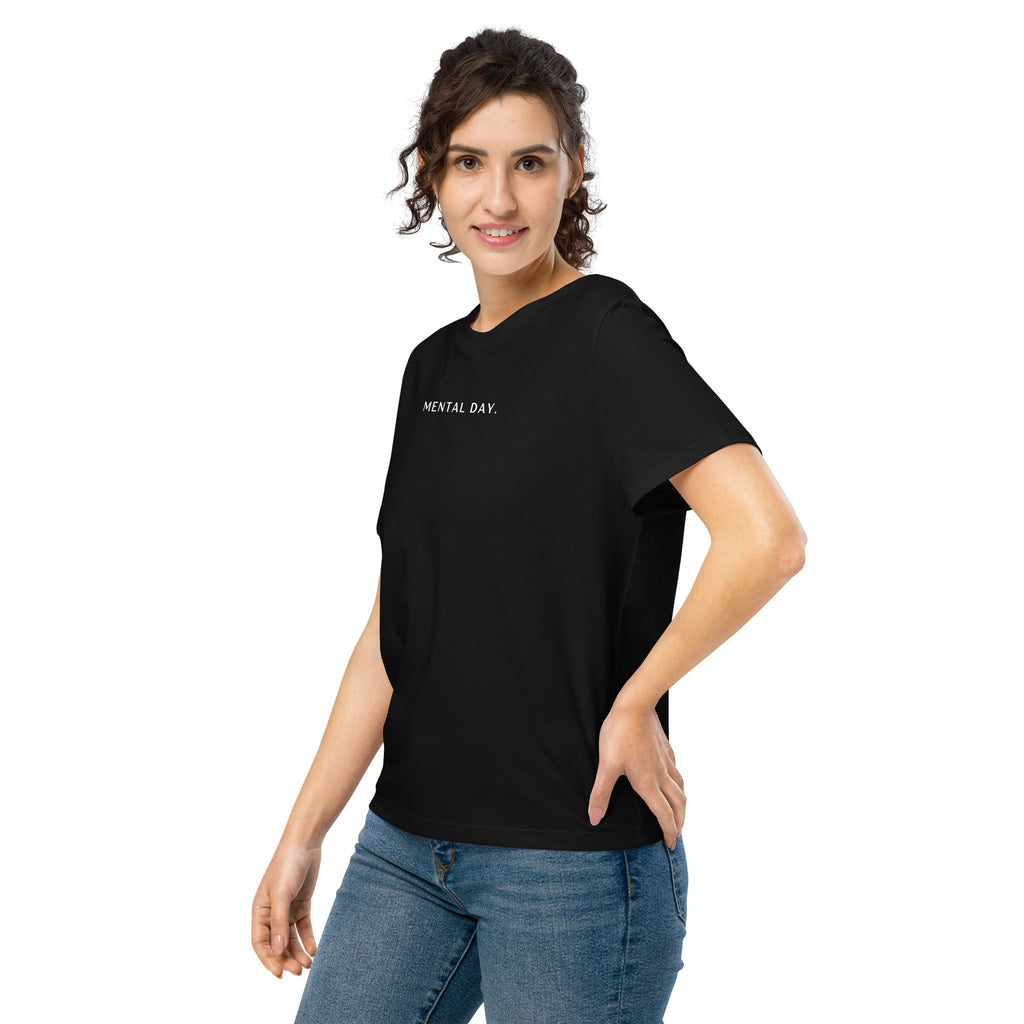 Woman wearing a 100% Organic Cotton black t-shirt with 'MENTAL DAY' text on a white background, avail at Oatmeal Apparel Co.