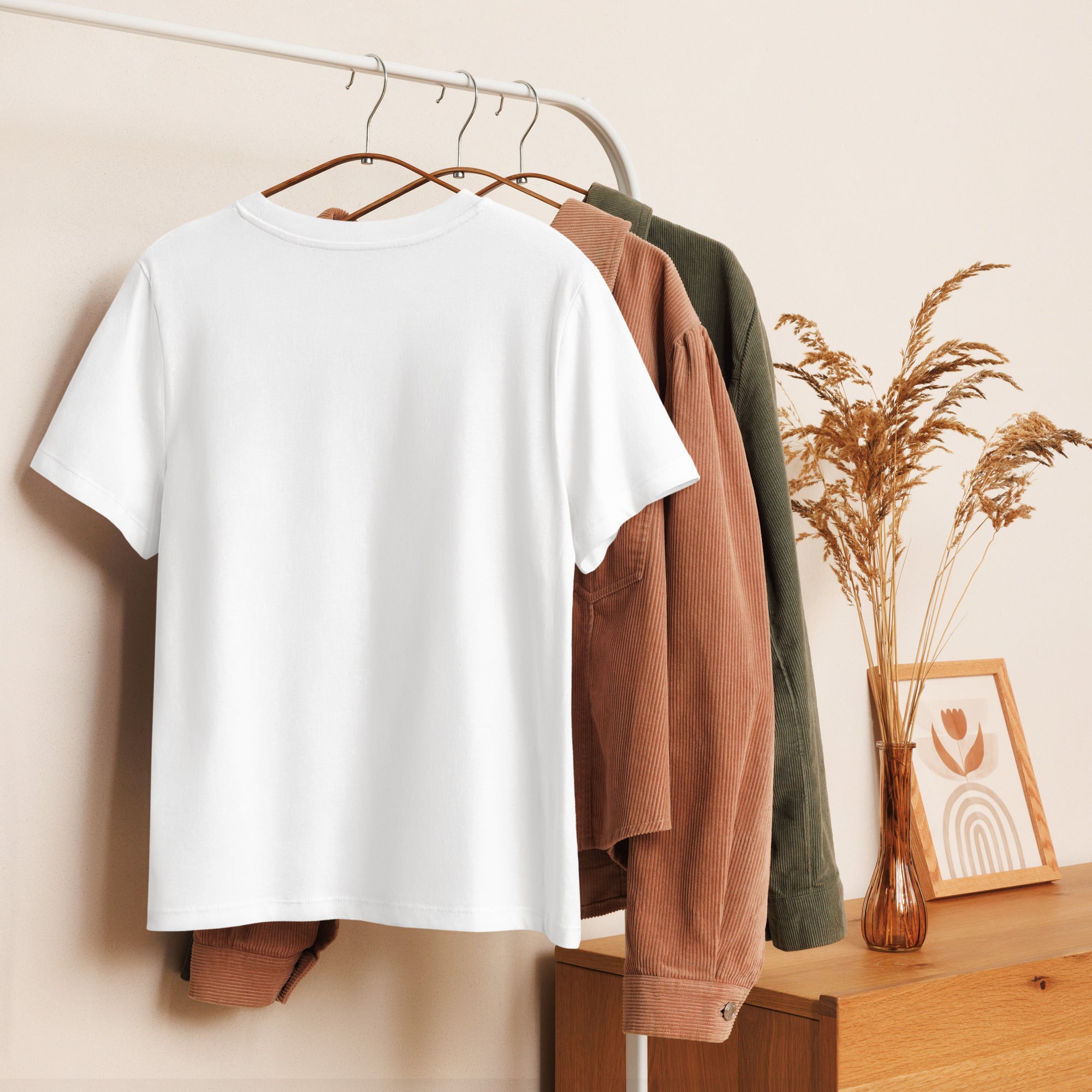 Showcasing the clean and polished back look of the Women's Organic White t-shirt with neutral background at Oatmeal Apparel Co.
