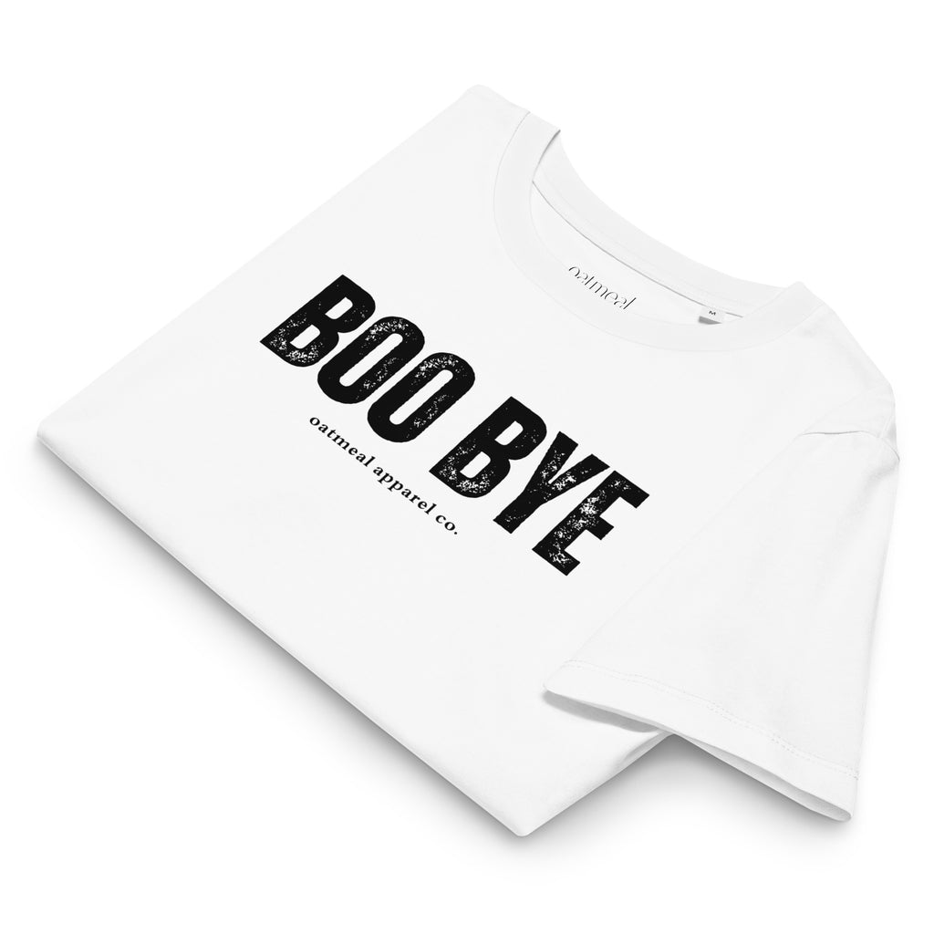 Folded White t-shirt with 'BOO BYE' text on a white background at Oatmeal Apparel Co.