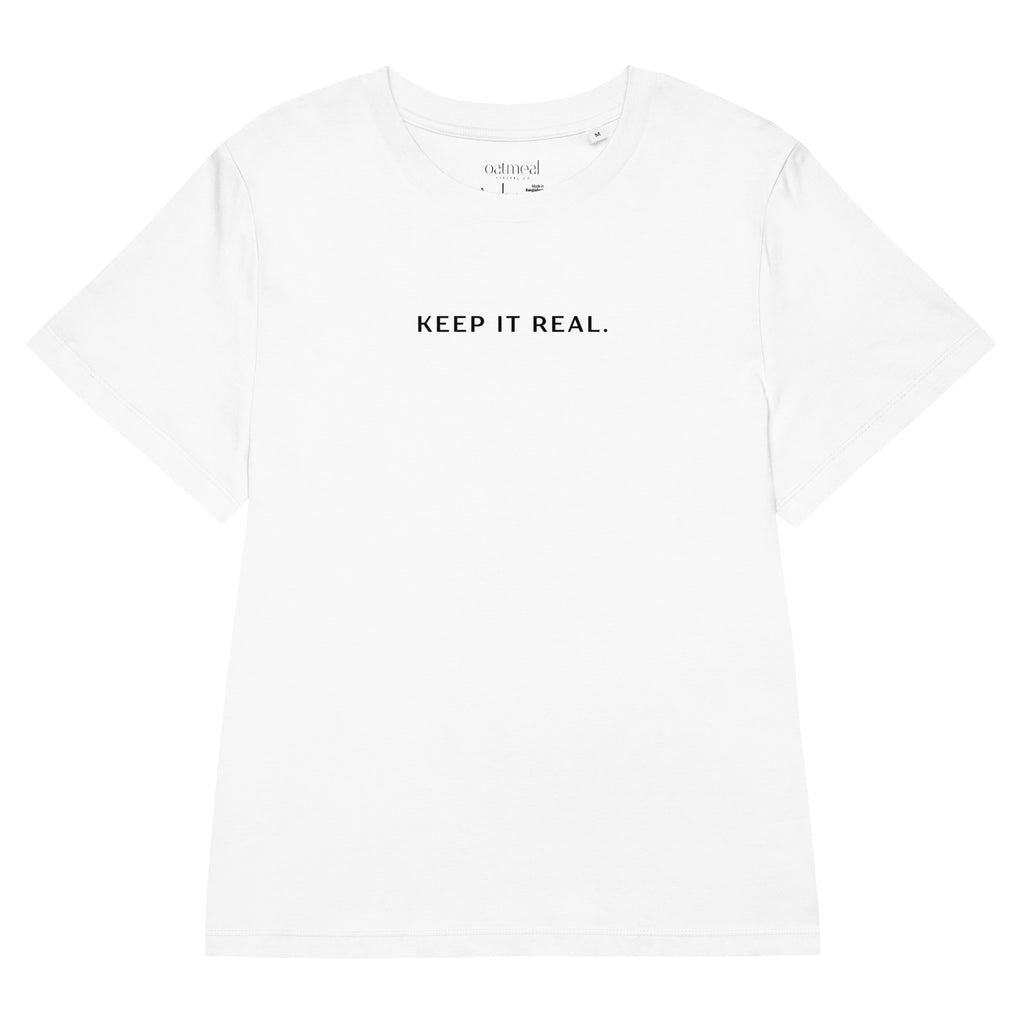 White t-shirt with 'KEEP IT REAL.' text on a white background at Oatmeal Apparel Co.
