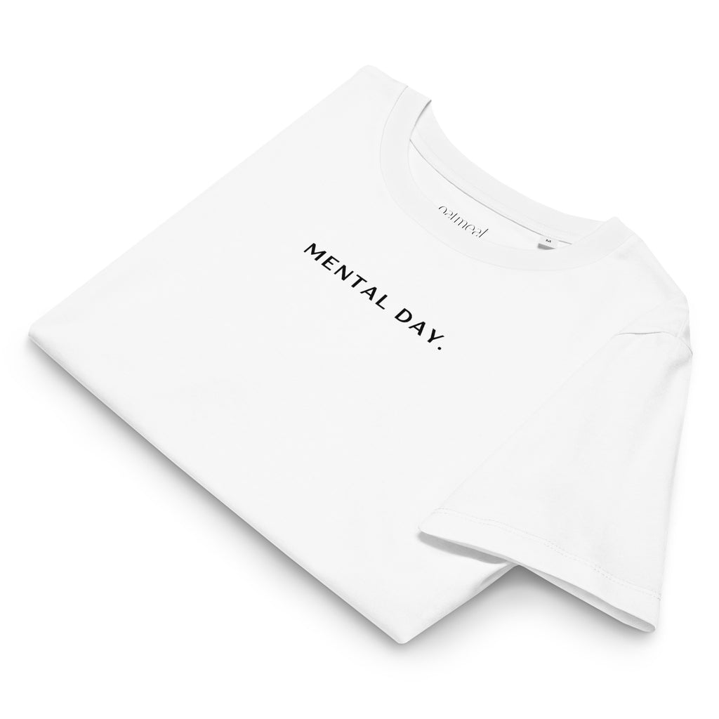 White t-shirt with 'MENTAL DAY.' text on a white background, available at Oatmeal Apparel Co.